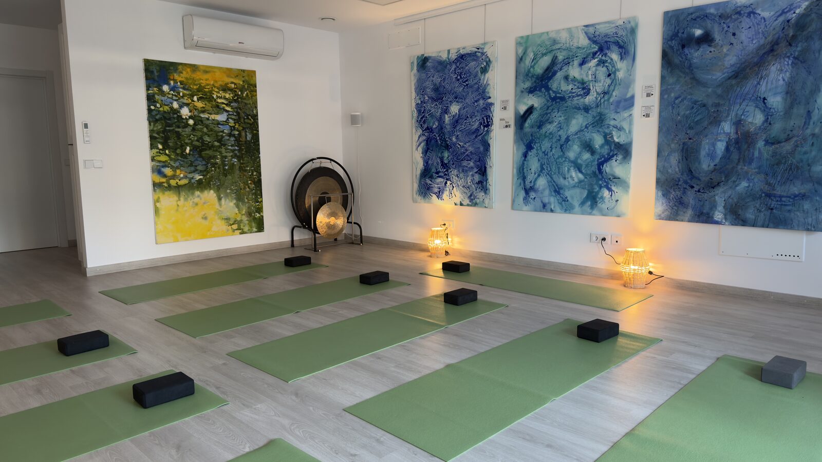 Inside The Space — yoga mats, gong and paintings